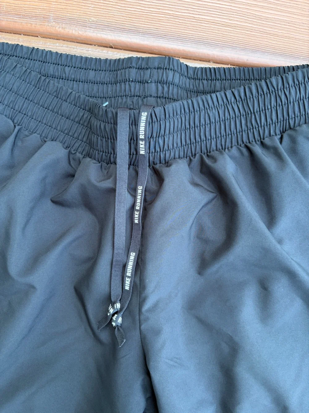 Nike Black running pants with White Care Tag